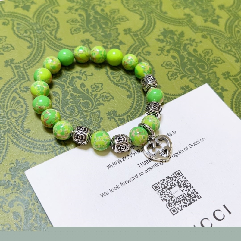 G*u*i bracelets